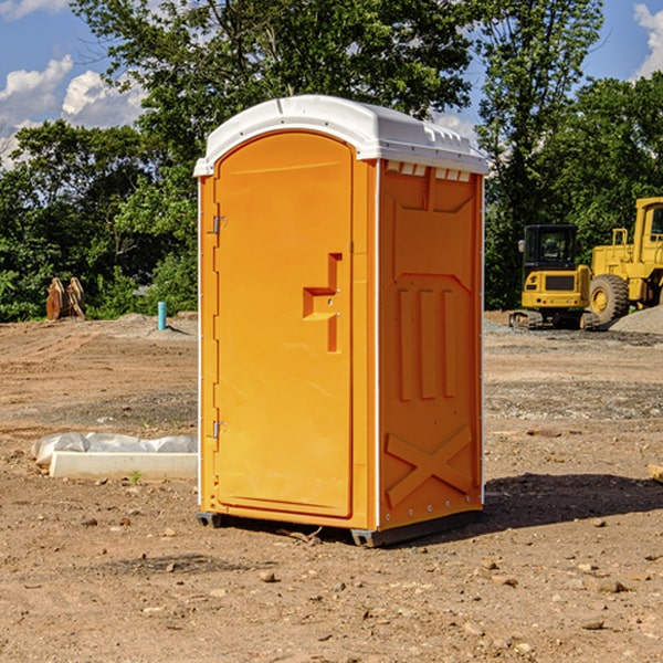 how often are the portable restrooms cleaned and serviced during a rental period in Dumont